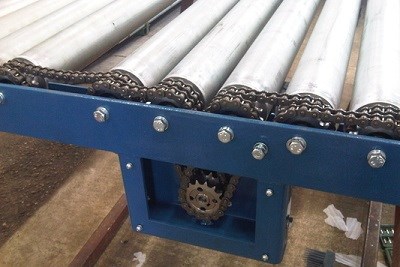 chain driven roller conveyors